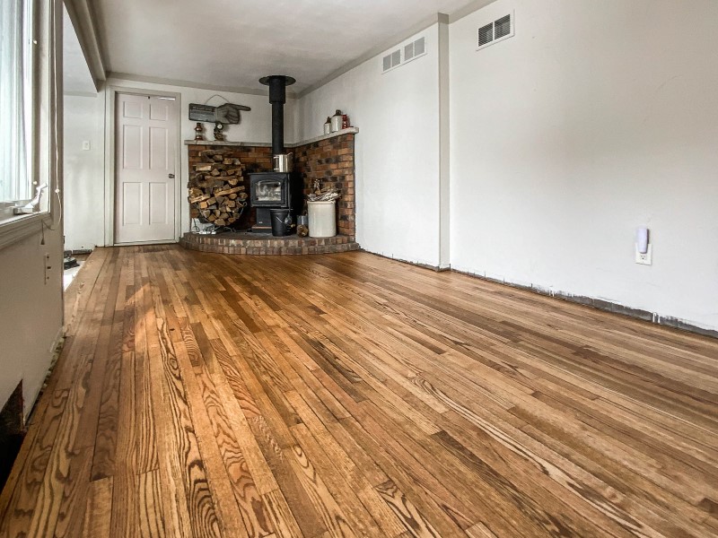 oak floor against natural wood stove